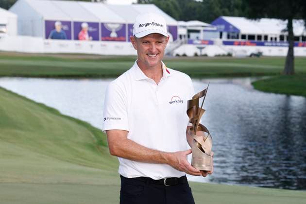 MEMPHIS, TN - AUGUST 10: Justin Rose of England holds the championship trophy following his win in the final round of the FedEx St. Jude Championship, August 10, 2025, at TPC Southwind in Memphis, Tennessee. (Photo by Matthew Maxey Icon Sportswire) GOLF: AUG 10 PGA, Golf Herren FedEx Cup Playoffs - FedEx St. Jude Championship EDITORIAL USE ONLY Icon250810045