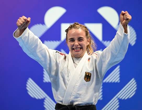 (250811) -- CHENGDU, Aug. 11, 2025 -- Gold medalist Sophie Buscher of Germany reacts during the awarding ceremony for the Women s -57kg Fighting of the Ju-Jitsu event at The World Games 2025 in Chengdu, southwest China s Sichuan Province, Aug. 11, 2025. ) (SP)CHINA-CHENGDU-THE WORLD GAMES 2025-JU-JITSU-WOMEN S -57KG FIGHTING-FINALS (CN) LixJianan 