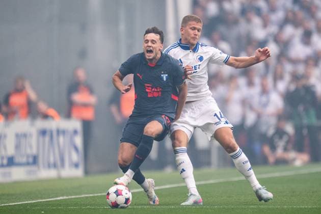 250812 Colin Rösler of Malmö FF and Andreas Cornelius of FC Copenhagen during the UEFA Champions League qualifier football match between FC Copenhagen and Malmö FF on August 12, 2025 in Copenhagen. Photo: Petter Arvidson BILDBYRAN kod PA PA1061 fotboll football soccer fotball uefa champions league champions league fc copenhagen malmö ff bbeng kval fc köpenhamn bbauto Copyright: PETTERxARVIDSON BB250812PA040