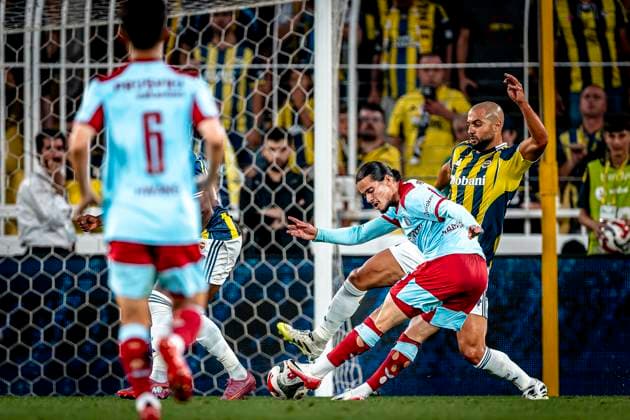 Feyenoord Rotterdam forwarder Anis Hadj Moussa, Fenerbahce SK midfielder Sofyan Amrabat during the match Fenerbahce - Feyenoord at the Åžükrü SaracoÄülu Spor Kompleksi for the Champions League - Third qualifying round - 2nd leg season 2025-2026 in ISTANBUL, Turkey on 10 august 2025, (photo by Marcel van Dorst EYE4images DeFodi Images)