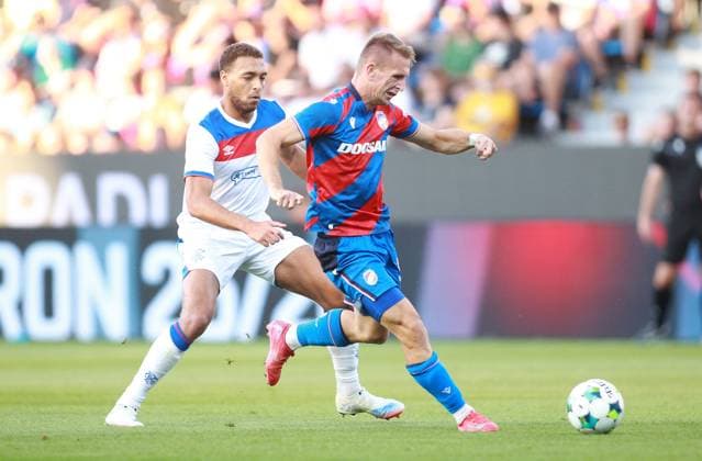 Amar Memic of Viktoria Plzen on the ball whilst being challenged by Cyriel Dessers of Rangers Viktoria Plzen v Rangers, UEFA Champions League, 3rd Qualifying Round, Second Leg, Football, Doosan Arena, Plzen, Czech Republic, UK - 12 Aug 2025Plzen Doosan Arena Czech Republic EDITORIAL USE ONLY No use with unauthorised audio, video, data, fixture lists, club league logos or live services. Online in-match use limited to 120 images, no video emulation. No use in betting, games or single club league player publications. Copyright: xMilanxKammermeyer Shutterstockx 15437971i