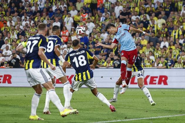 ISTANBUL , 12-08-2025 , Sukru Saracoglu stadium , season 2025 2026 , UEFA Champions League , 3th qualifying round, 2nd leg between Fenerbahce and Feyenoord , picture shows.Fenerbahce player Mert Muldur Feyenoord player Tsuyoshi Watanabe Fenerbahce player Sofyan Amrabat Fenerbahce - Feyenoord  x30479276x Copyright: