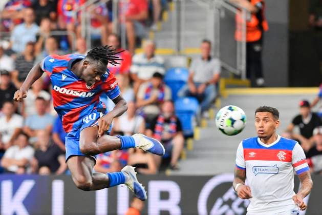 L-R Princ Adu (Plzen) and James Tavernier (Glasgow) in action during the 3rd qualifying round match FC Viktoria Plzen vs Glasgow Ranger, Plzen, August 12, 2025. (CTKxPhoto MiroslavxChaloupka) CTKPhotoP2025081206202  CTKPhotoP2025081206202