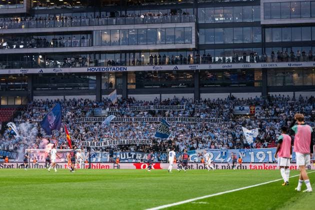 250812 Fans of Malmö FF with a banner during the UEFA Champions League qualifier football match between FC Copenhagen and Malmö FF on August 12, 2025 in Copenhagen. Photo: Petter Arvidson BILDBYRAN kod PA PA1061 fotboll football soccer fotball uefa champions league champions league fc copenhagen malmö ff bbeng kval fc köpenhamn publik Copyright: PETTERxARVIDSON BB250812PA080