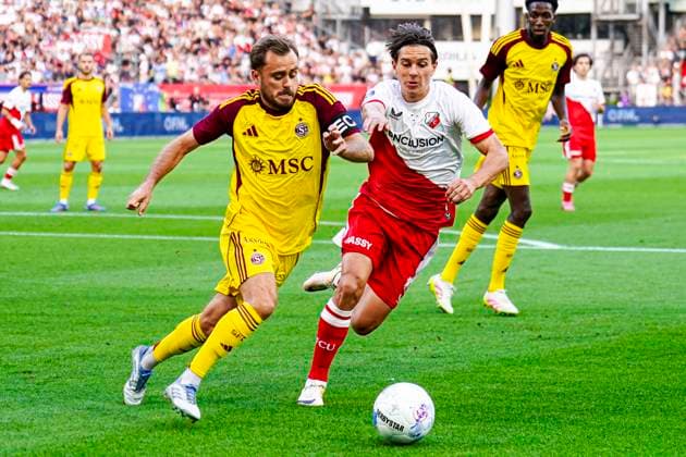 2025-08-14 FC Utrecht v Servette FC - UEFA Europa League 2025 26 Third Qualifying Round Second Leg UTRECHT, NETHERLANDS - AUGUST 14: Timothe Cognat of Servette FC battles for possession with Victor Jensen of FC Utrecht during the UEFA Europa League 2025 26 Third Qualifying Round Second Leg match between FC Utrecht and Servette FC at Stadion Galgenwaard on August 14, 2025 in Utrecht, Netherlands. Utrecht Stadion Galgenwaard Netherlands Content not available for redistribution in The Netherlands directly or indirectly through any third parties. Copyright: xJorisxVerwijstx