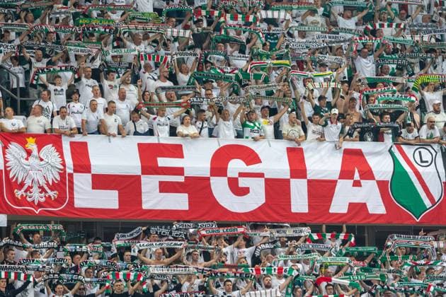 Legia Warszawa - AEK Larnaka 14.08.2025 football, Warsaw, UEFA Europa League qualifiers third qualifying round , game Legia Warszawa - AEK Larnaka (pilka nozna eliminacje Liga Europy, 3 trzecia runda , Legia Warszawa - AEK Larnaka) image shows: Legia Warszawa fans, flag, photo Katarzyna Plewczynska Fotostyk Copyright: xKatarzynaxPlewczynska Fotostykx 20250814FCTKP031