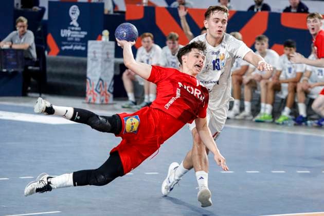 (250815) -- CAIRO, Aug. 15, 2025 -- Magnus Boysen Moldrup (front) of Denmark shoots during the quarterfinal handball match between Denmark and Iceland at the 11th IHF Men s Youth World Championship, WM, Weltmeisterschaft 2025 in Cairo, Egypt, on Aug. 14, 2025. ) (SP)EGYPT-CAIRO-HANDBALL-MEN S YOUTH WORLD CHAMPIONSHIP-QUARTERFINAL-DENMARK VS ICELAND AhmedxGomaa 