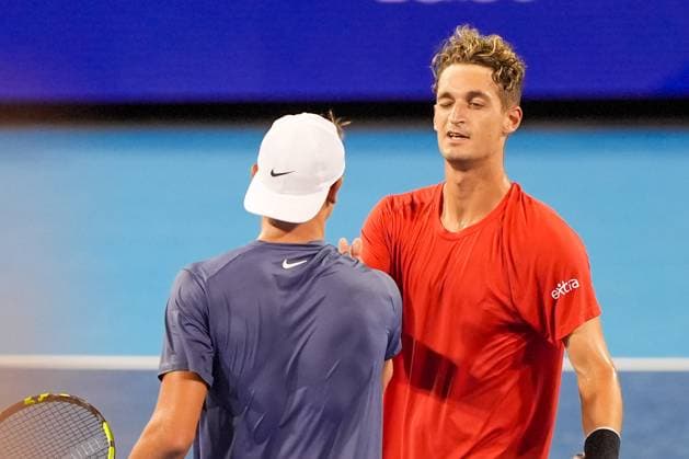 August 14, 2025, Mason, Ohio, USA: Terence Atmane (FRA)(R) winks and shakes hands with Holger Rune (DEN) after winning the fourth round of mens singles at the 2025 Cincinnati Open at Lindner Family Tennis Center. Mason USA - ZUMAw109 20250814_fap_w109_007 Copyright: xDebbyxWongx