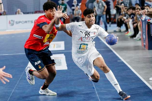 (250815) -- CAIRO, Aug. 15, 2025 -- Ahmed Mohammed (R) of Egypt breaks through during the quarterfinal handball match between Spain and Egypt at the 11th IHF Men s Youth World Championship, WM, Weltmeisterschaft 2025 in Cairo, Egypt, on Aug. 14, 2025. ) (SP)EGYPT-CAIRO-HANDBALL-MEN S YOUTH WORLD CHAMPIONSHIP-QUARTERFINAL-SPAIN VS EGYPT AhmedxGomaa 
