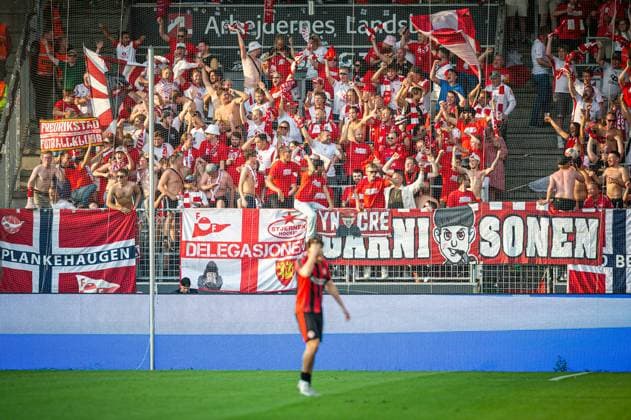 FC Midtjylland v Fredrikstad, UEFA Europa League qualification, Herning, Denmark Herning, Denmark. 14th, August 2025. Football fans of Fredrikstad seen on the stands at the UEFA Europa League qualification match between FC Midtjylland and Fredrikstad at MCH Arena in Herning. Denmark, Herning  Copyright: xGonzalesxPhoto MortenxKjaerx