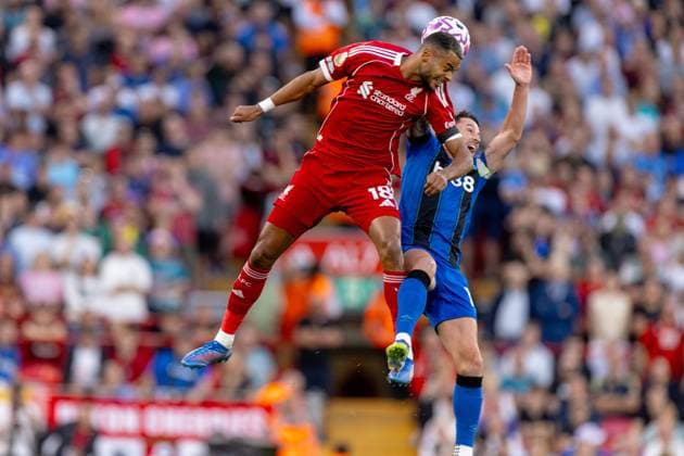 Football - FA Premier League - Liverpool FC v AFC Bournemouth LIVERPOOL, ENGLAND - Friday, August 15, 2025: Liverpool s Cody Gakpo challenges for a header with Bournemouth s captain Adam Smith during the FA Premier League match between Liverpool FC and AFC Bournemouth at Anfield. (Photo by David Rawcliffe Propaganda) LIVERPOOL Anfield MERSEYSIDE ENGLAND  Copyright: xDavidxRawcliffex P2025-08-15-Liverpool_Bournemouth-20