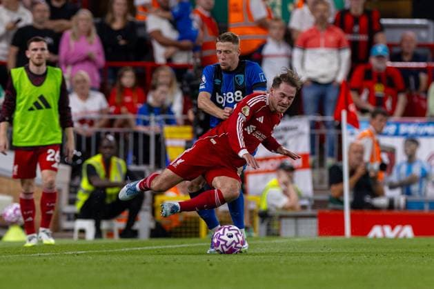 Football - FA Premier League - Liverpool FC v AFC Bournemouth LIVERPOOL, ENGLAND - Friday, August 15, 2025: Liverpool s Alexis Mac Allister is challenged Bournemouth s Adrien Truffert during the FA Premier League match between Liverpool FC and AFC Bournemouth at Anfield. (Photo by David Rawcliffe Propaganda) LIVERPOOL Anfield MERSEYSIDE ENGLAND  Copyright: xDavidxRawcliffex P2025-08-15-Liverpool_Bournemouth-60
