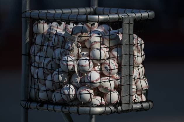 August 15, 2025: A container of practice balls sits near the batting cage as Chicago White Sox players take batting practice before a game against the Kansas City Royals at Kauffman Stadium in Kansas City, MO. CSM Kansas City United States of America - ZUMAc04_ 20250815_zma_c04_116 Copyright: xDavidxSmithx