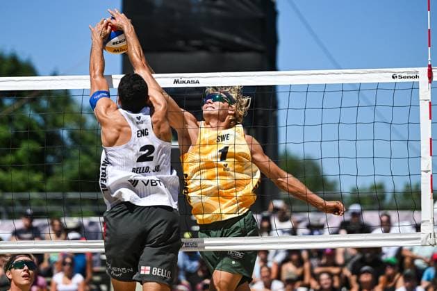 MONTREAL, QC - AUGUST 15: Joaquin Bello (ENG) blocks David Ahman (SWE) smash during a main draw match at Beach Pro Tour Montreal Elite 16 on August 15, 2025 at Parc Jean-Drapeau in Montreal, QC (Photo by David Kirouac Icon Sportswire) VOLLEYBALL: AUG 15 Beach Pro Tour Montreal Elite 16 EDITORIAL USE ONLY Icon250815089