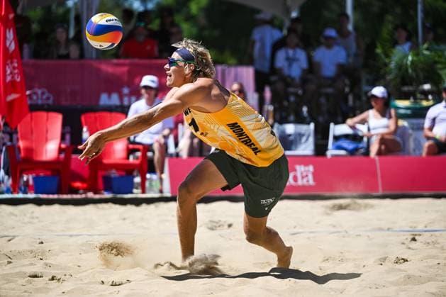 MONTREAL, QC - AUGUST 15: David Ahman (SWE) bumps the ball during a main draw match at Beach Pro Tour Montreal Elite 16 on August 15, 2025 at Parc Jean-Drapeau in Montreal, QC (Photo by David Kirouac Icon Sportswire) VOLLEYBALL: AUG 15 Beach Pro Tour Montreal Elite 16 EDITORIAL USE ONLY Icon250815079