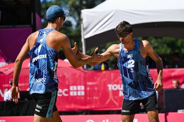 MONTREAL, QC - AUGUST 15: Nicolas Capogrosso N. (ARG) and Tomas Capogrosso (ARG) react after scoring a point during a first round match at Beach Pro Tour Montreal Elite 16 on August 15, 2025 at Parc Jean-Drapeau in Montreal, QC (Photo by David Kirouac Icon Sportswire) VOLLEYBALL: AUG 15 Beach Pro Tour Montreal Elite 16 EDITORIAL USE ONLY Icon250815049