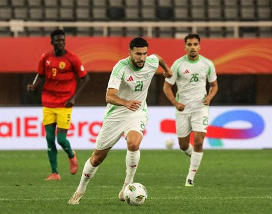 (250816) -- KAMPALA, Aug. 16, 2025 -- Mehdi Merghem (C) of Algeria controls the ball during the Group C football match between Guinea and Algeria at the African Nations Championship (CHAN) 2024 at Mandela National Stadium in Kampala, capital of Uganda, on Aug. 15, 2025. (Photo by Xinhua) (SP)UGANDA-KAMPALA-FOOTBALL-CHAN2024-GROUP C-GUINEA VS ALGERIA HajarahxNalwadda 
