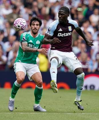 Birmingham, England, 16th August 2025. Amadou Onana of Aston Villa (R) is challenged by Sandro Tonali of Newcastle United during the Aston Villa vs Newcastle United Premier League match at Villa Park, Birmingham. Picture credit should read: Andrew Yates Sportimage EDITORIAL USE ONLY. No use with unauthorised audio, video, data, fixture lists, club league logos or live services. Online in-match use limited to 120 images, no video emulation. No use in betting, games or single club league player publications. SPI_010_AY_VILLA_NEWC SPI-4068-0010