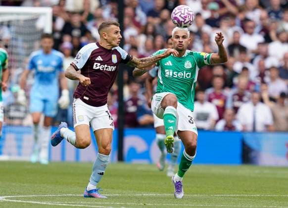Birmingham, England, 16th August 2025. Bruno Guimaraes of Newcastle United (R) is challenged by Lucas Digne of Aston Villa during the Aston Villa vs Newcastle United Premier League match at Villa Park, Birmingham. Picture credit should read: Andrew Yates Sportimage EDITORIAL USE ONLY. No use with unauthorised audio, video, data, fixture lists, club league logos or live services. Online in-match use limited to 120 images, no video emulation. No use in betting, games or single club league player publications. SPI_021_AY_VILLA_NEWC SPI-4068-0022