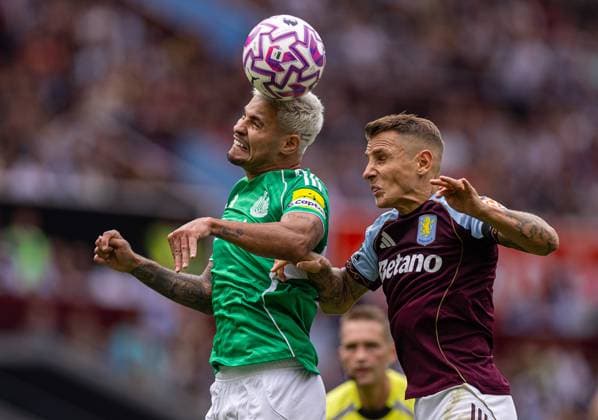 Football - FA Premier League - Aston Villa FC v Newcastle United FC BIRMINGHAM, ENGLAND - Saturday, August 16, 2025: Newcastle United s captain Bruno Guimaraes (L) challenges for a header with Aston Villa s Lucas Digne during the FA Premier League match between Aston Villa FC and Newcastle United FC at Villa Park. (Photo by David Rawcliffe Propaganda) BIRMINGHAM Villa Park WEST MIDLANDS ENGLAND  Copyright: xDavidxRawcliffex P2025-08-16-Aston_Villa_Newcastle-30