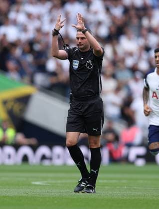 London, England, 16th August 2025. Referee Michael Oliver gestures with 8 fingers after Martin Dubravka (not pictured) of Burnley holds onto the ball for too long and Tottenham are awarded a corner kick during the Tottenham Hotspur vs Burnley Premier League match at the Tottenham Hotspur Stadium, London. Picture credit should read: Paul Terry Sportimage EDITORIAL USE ONLY. No use with unauthorised audio, video, data, fixture lists, club league logos or live services. Online in-match use limited to 120 images, no video emulation. No use in betting, games or single club league player publications. SPI_014_PT_Tottenham_Burnley SPI-4069-0014