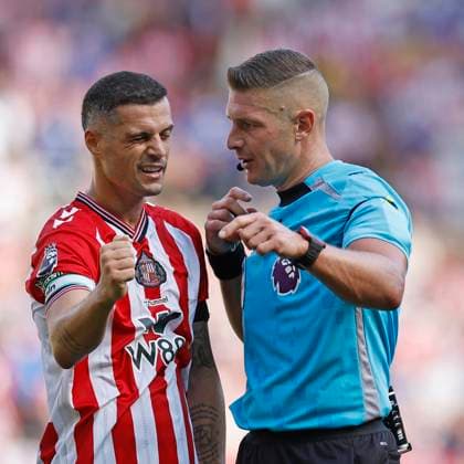 Sunderland v West Ham United Premier League Granit Xhaka of Sunderland (left) queries a decision with Referee Robert Jones during the Premier League match at the Stadium Of Light, Sunderland UK Newspapers OUT Copyright: xFredxPalmerx FIL-22107-0072