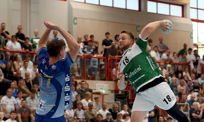 16.08.2025, xfsx, Herren, Handball, Saison 2025 2026, DHB-Pokal, 1. Runde: Woelfe Wuerzburg - TV Grosswalstadt v.li.: Sebastian Trost (TV Grosswallstadt), Steffen Kaufmann (Woelfe Wuerzburg) Rimpar Dreifachsporthalle Bayern Deutschland