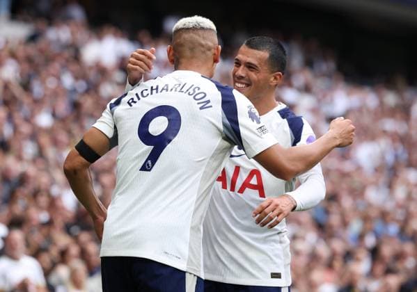 London, England, 16th August 2025. Richarlison of Tottenham Hotspur celebrates with Pedro Porro of Tottenham Hotspur after scoring to make it 2-0 during the Tottenham Hotspur vs Burnley Premier League match at the Tottenham Hotspur Stadium, London. Picture credit should read: Paul Terry Sportimage EDITORIAL USE ONLY. No use with unauthorised audio, video, data, fixture lists, club league logos or live services. Online in-match use limited to 120 images, no video emulation. No use in betting, games or single club league player publications. SPI_033_PT_Tottenham_Burnley SPI-4069-0033
