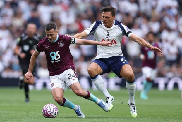 London, England, 16th August 2025. Josh Cullen of Burnley and Joao Palhinha of Tottenham Hotspur challenge for the ball during the Tottenham Hotspur vs Burnley Premier League match at the Tottenham Hotspur Stadium, London. Picture credit should read: Paul Terry Sportimage EDITORIAL USE ONLY. No use with unauthorised audio, video, data, fixture lists, club league logos or live services. Online in-match use limited to 120 images, no video emulation. No use in betting, games or single club league player publications. SPI_056_PT_Tottenham_Burnley SPI-4069-0056