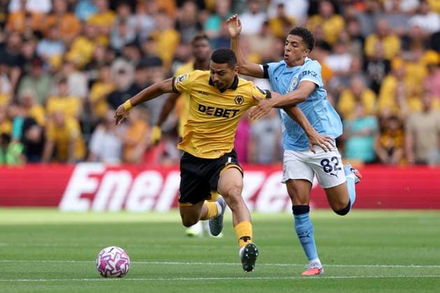 Wolverhampton Wanderers v Manchester City - Premier League Andre of Wolverhampton Wanderers and Rico Lewis of Manchester City during the Premier League match between Wolverhampton Wanderers and Manchester City at Molineux on August 16, 2025 in Wolverhampton, England. Wolverhampton Molineux England United Kingdom Copyright: xNealxSimpson Sportsphoto APLx 14132918