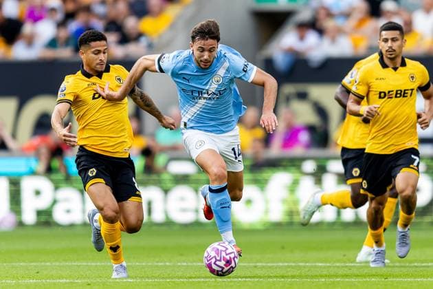 Wolverhampton Wanderers v Manchester City Premier League 16 08 2025. Manchester City midfielder Nico Gonzalez (14) runs forward during the Premier League match between Wolverhampton Wanderers and Manchester City at Molineux, Wolverhampton, England on 16 August 2025. Wolverhampton Molineux West Midlands England Editorial use only DataCo restrictions apply See www.football-dataco.com , Copyright: xManjitxNarotrax PSI-22617-0015