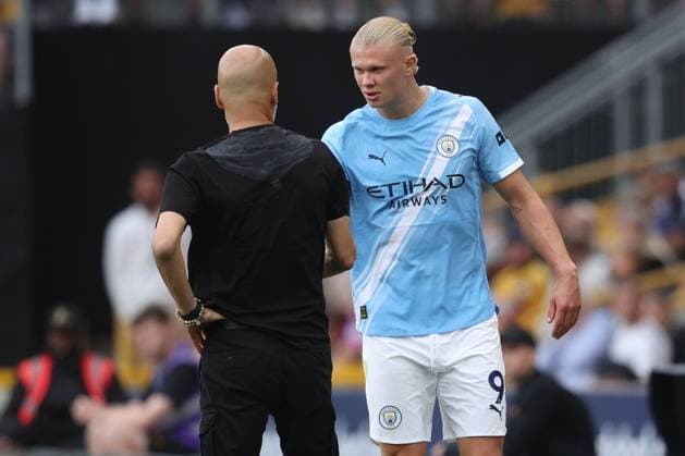 Wolverhampton Wanderers v Manchester City - Premier League Pep Guardiola, Manager of Manchester City and Erling Haaland of Manchester City on the side line during the Premier League match between Wolverhampton Wanderers and Manchester City at Molineux on August 16, 2025 in Wolverhampton, England. Wolverhampton Molineux England United Kingdom Copyright: xNealxSimpson Sportsphoto APLx 14132932