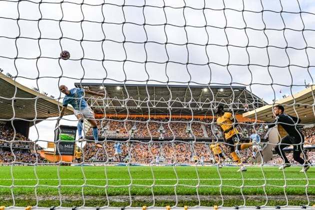 16th August 2025; Molineux Stadium, Wolverhampton, West Midlands, England; Premier League Football, Wolverhampton Wanderers versus Manchester City; Erling Haaland of Manchester City heads over the bar  GodfreyxPitt