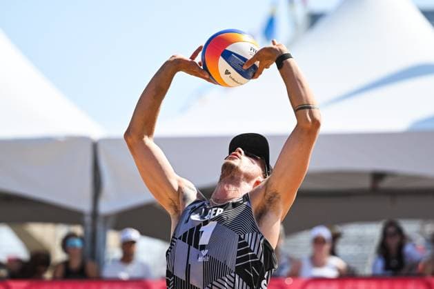 MONTREAL, QC - AUGUST 16: Lukas Pfretzschner L. (GER) bumps the ball during a round of 12 match at Beach Pro Tour Montreal Elite 16 on August 16, 2025 at Parc Jean-Drapeau in Montreal, QC (Photo by David Kirouac Icon Sportswire) VOLLEYBALL: AUG 16 Beach Pro Tour Montreal Elite 16 EDITORIAL USE ONLY Icon250816018