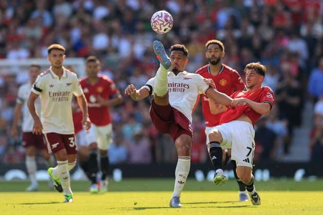 Manchester United, ManU v Arsenal Premier League 17 08 2025. William Saliba (2) of Arsenal beats Mason Mount (7) of Manchester United to the ball during the Premier League match between Manchester United and Arsenal at Old Trafford, Manchester, England on 17 August 2025. Manchester Old Trafford Greater Manchester England Editorial use only DataCo restrictions apply See www.football-dataco.com , Copyright: xConorxMolloyx PSI-22618-0039