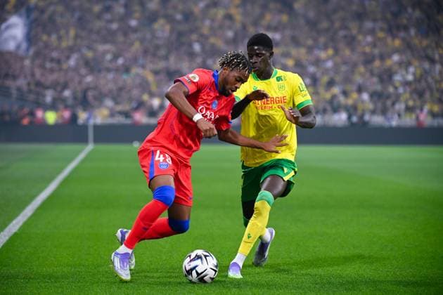 FOOTBALL : Nantes vs PSG - Ligue 1 - 17 08 2025 Ibrahim Mbaye ( 49 - PSG ) and Bahereba Guirassy ( 11 - Nantes ) during the Ligue 1match between FC Nantes and Paris Saint Germain at Stade de la Beaujoire on August 17, 2025 in Nantes, France. ( Photo by Dante Badano PsnewZ ) - NantesFrance  Copyright: xDantexBadanox