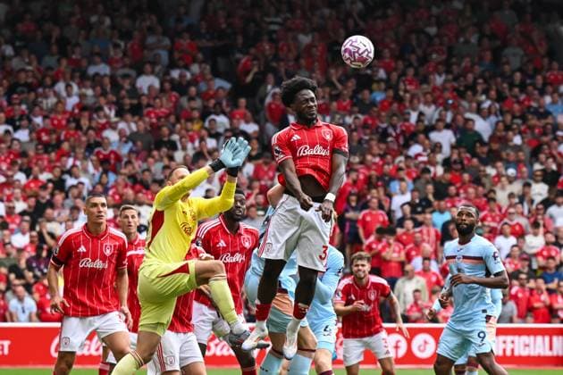 Nottingham, England, 17th August 2025. Ola Aina of Nottingham Forest heads clear from a corner during the Nottingham Forest vs Brentford Premier League match at the City Ground, Nottingham. Picture credit should read: Craig Thomas Sportimage EDITORIAL USE ONLY. No use with unauthorised audio, video, data, fixture lists, club league logos or live services. Online in-match use limited to 120 images, no video emulation. No use in betting, games or single club league player publications. SPI_124_CT_Nottingham_Forest_v_Brentford SPI-4071-0126