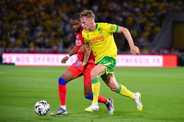 FOOTBALL : Nantes vs PSG - Ligue 1 - 17 08 2025 Ibrahim Mbaye ( 49 - PSG ) and Nicolas Cozza ( 3 - Nantes ) during the Ligue 1match between FC Nantes and Paris Saint Germain at Stade de la Beaujoire on August 17, 2025 in Nantes, France. ( Photo by Dante Badano PsnewZ ) - NantesFrance  Copyright: xDantexBadanox