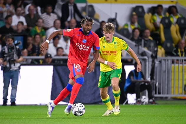 FOOTBALL : Nantes vs PSG - Ligue 1 - 17 08 2025 Ibrahim Mbaye ( 49 - PSG ) and Johann Lepenant ( 8 - Nantes ) during the Ligue 1match between FC Nantes and Paris Saint Germain at Stade de la Beaujoire on August 17, 2025 in Nantes, France. ( Photo by Dante Badano PsnewZ ) - NantesFrance  Copyright: xDantexBadanox