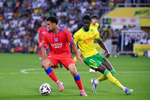 FOOTBALL : Nantes vs PSG - Ligue 1 - 17 08 2025 Warren ZAIRE EMERY ( 33 - PSG ) and Bahereba Guirassy ( 11 - Nantes ) during the Ligue 1match between FC Nantes and Paris Saint Germain at Stade de la Beaujoire on August 17, 2025 in Nantes, France. ( Photo by Dante Badano PsnewZ ) - NantesFrance  Copyright: xDantexBadanox