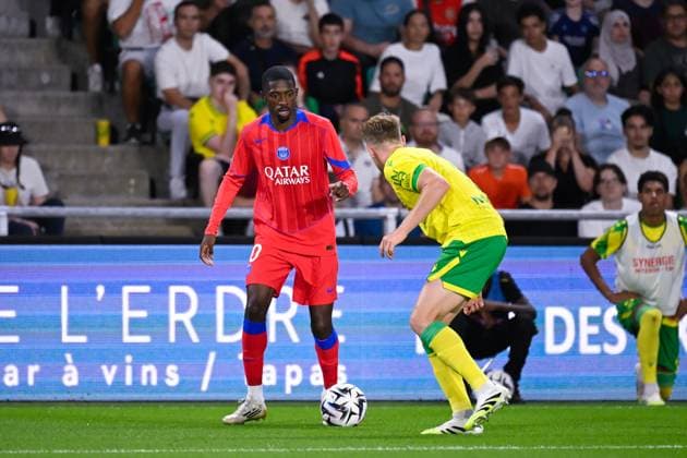 FOOTBALL : Nantes vs PSG - Ligue 1 - 17 08 2025 Ousmane DEMBELE ( 10 - PSG ) and Nicolas Cozza ( 3 - Nantes ) during the Ligue 1match between FC Nantes and Paris Saint Germain at Stade de la Beaujoire on August 17, 2025 in Nantes, France. ( Photo by Dante Badano PsnewZ ) - NantesFrance  Copyright: xDantexBadanox