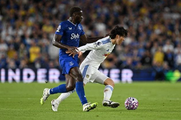 Tim Iroegbunam of Everton and Ao Tanaka of Leeds United Leeds United v Everton, Premier League, Football, Elland Road, Leeds, UK - 18 Aug 2025Leeds Elland Road United Kingdom EDITORIAL USE ONLY No use with unauthorised audio, video, data, fixture lists, club league logos or live services. Online in-match use limited to 120 images, no video emulation. No use in betting, games or single club league player publications. Copyright: xAnnaxGowthorpe Shutterstockx 15446420af