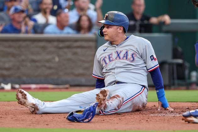 August 18, 2025: Texas Rangers designated hitter Joc Pederson (4) reacts after being tagged out at home by Kansas City Royals catcher Luke Maile (17) during the second inning of a baseball game at Kauffman Stadium in Kansas City, MO. CSM Kansas City United States of America - ZUMAc04_ 20250818_zma_c04_016 Copyright: xDavidxSmithx