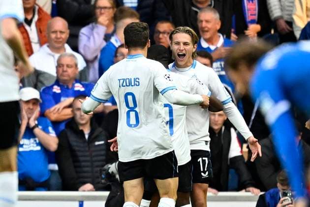 Rangers FC v Club Brugge - UEFA Champions League GLASGOW, SCOTLAND - AUGUST 19 : Vermant Romeo forward of Club Brugge celebrates scoring a goal with teammates during the UEFA Champions League 2025 26 play-off round first leg between Rangers FC and Club Brugge on August 19, 2025 in Glasgow, Scotland, 19 08 2025 Glasgow Scotland  Copyright: xTomasxSiskx