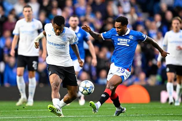 Rangers FC v Club Brugge - UEFA Champions League GLASGOW, SCOTLAND - AUGUST 19 : Onyedika Nwadike Raphael midfielder of Club Brugge and Pereira Da Silva Danilo forward of Rangers FC during the UEFA Champions League 2025 26 play-off round first leg between Rangers FC and Club Brugge on August 19, 2025 in Glasgow, Scotland, 19 08 2025 Glasgow Scotland  Copyright: xTomasxSiskx