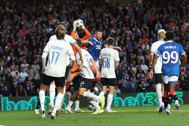 Club Brugge goalkeeper Simon Mignolet grabs the ball from John Souttar of Rangers during the Champions League first leg play off match at Ibrox Stadium, Glasgow. Rangers v Club Brugge - UEFA - Champions League Play-offs - Ibrox Stadium, Glasgow, Lanarkshire, Scotland, UK - 19 Aug 2025Glasgow Ibrox Lanarkshire United Kingdom  Copyright: xO Rourke RangersxFC Shutterstockx 15447857u