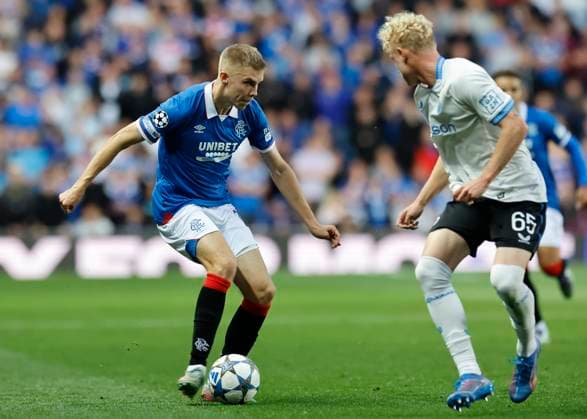 Rangers v Club Brugge UEFA Champions League Oliver Antman of Rangers (left) drives forward with the ball towards Joaquin Seys of Club Brugge during the UEFA Champions League Play-off First Leg match at Ibrox Stadium, Glasgow UK Newspapers OUT Copyright: xFredxPalmerx FIL-22118-0082