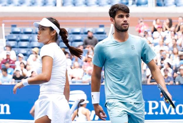 Emma Raducanu of Great Britain and Carlos Alcaraz of Spain react after a point in their round one match against Jessica Pegula and Jack Draper of Great Britain in the mixed doubles championships in Arthur Ashe Stadium at the 2025 US Open Tennis Championship at the USTA Billie Jean King National Tennis Center in New York City on Tuesday, August 19, 2025 in New York City. Jessica Pegula and Jack Draper of Great Britain defeated Emma Raducanu of Great Britain and Carlos Alcaraz of Spain 4-2, 4-2 and advance to the quarterfinals.  NYP20250819103 JOHNxANGELILLO