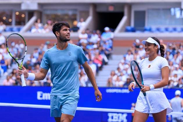August 19, 2025, Flushing Meadows, New York, USA: Emma Raducanu and Carlos Alcaraz react after winning a point during a mix doubles match against Jessica Pegula and Jack Draper at the 2025 US Open at USTA Billie Jean King National Tennis Center on Tuesday August 19, 2025 in the Flushing neighborhood of the Queens borough of New York City. JAVIER ROJAS PI Flushing Meadows USA - ZUMAp124 20250819_zaa_p124_052 Copyright: xJavierxRojasx