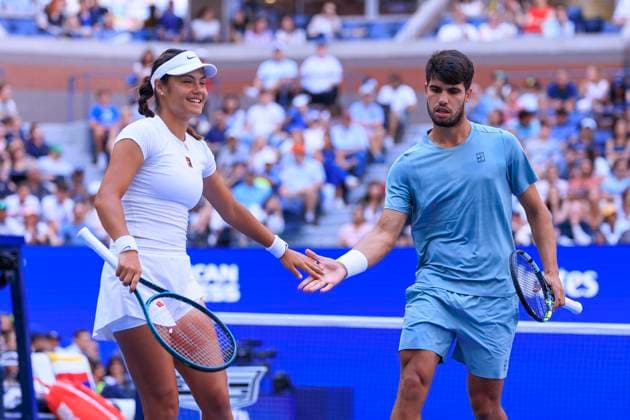 August 19, 2025, Flushing Meadows, New York, USA: Emma Raducanu and Carlos Alcaraz react after winning a point during a mix doubles match against Jessica Pegula and Jack Draper at the 2025 US Open at USTA Billie Jean King National Tennis Center on Tuesday August 19, 2025 in the Flushing neighborhood of the Queens borough of New York City. JAVIER ROJAS PI Flushing Meadows USA - ZUMAp124 20250819_zaa_p124_053 Copyright: xJavierxRojasx